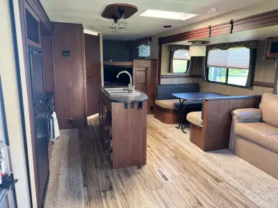 2015 Prowler 29P IKS – Bunks, 2 Slides Clean, spacious family trailer ready to camp. Sleeps up to 10...