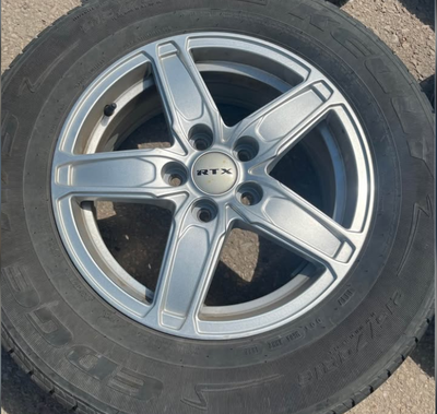 I have 4 matching alloy rims 5x114 bolt pattern in excellent shape on 4 matching tires 215/70R16 als...