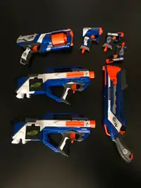 Assorted NERF Guns/Blasters with darts and magazines