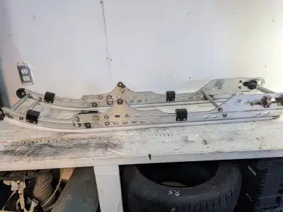 Great set of rails, plus couple idler wheels, rear axle, front and rear swing arms (not pictured). F...