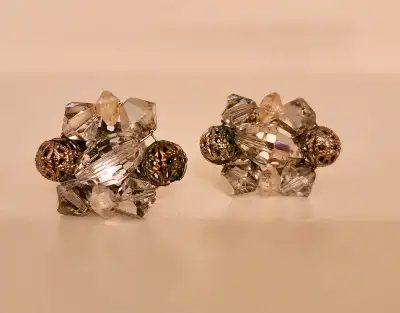 I found these clip-on earrings in my late mother's house several years ago. No makers mark, but they...