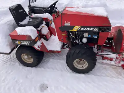 1988 Steiner S-20. 4x4 articulating tractor. 20HP gas engine. Runs great. Well maintained. 54” snowb...