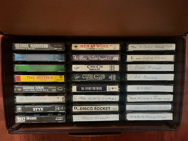 24 cassettes and case, $5 each or everything for $99 in CDs, DVDs & Blu-ray in Vancouver