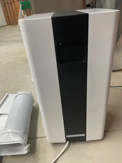 The Midea 10,000 BTU ASHRAE (7,000 BTU SACC) Portable Air Conditioner will keep you feeling cool dur...
