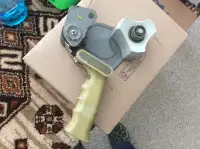Tape roll dispenser gun