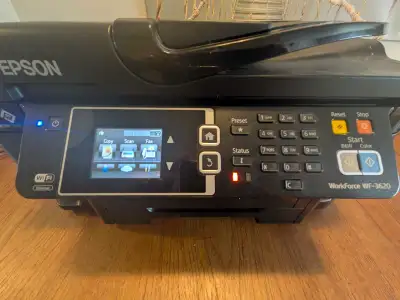 This is an Epson WorkForce WF-3620 all-in-one printer. It's a black device with Wi-Fi and Ethernet c...