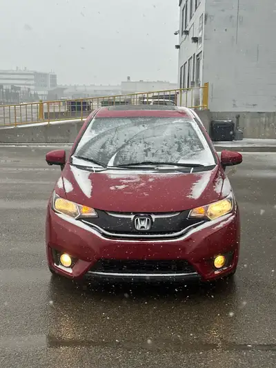 2016 Honda Fit EX for sale in Calgary, AB. 167,000 KM | Automatic | Rebuild Status | Red Price: $11,...