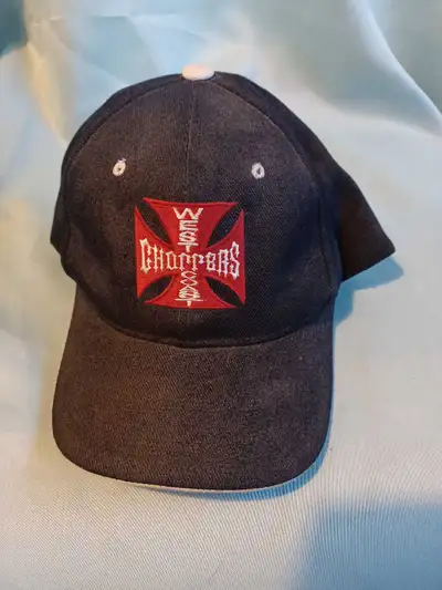 Get ready to rev up your style with this West Coast Choppers baseball hat! This hat is in good condi...
