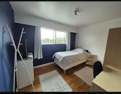 Private bedroom on top floor of our 5 bedroom home. Room can be furnished or unfurnished as in the p...