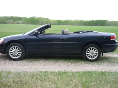 Convertible season is here! Cruise around this summer with the top down in this beauty! 2003 Chrysle...