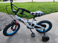 FREE - 14" kids bike with training wheels (needs rear tire) 