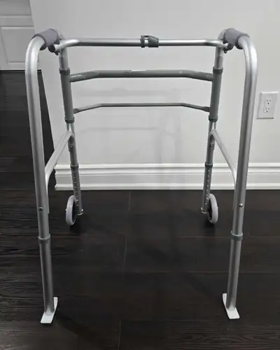 Like-New Walker with Wheels Description: Like-new walker in excellent condition. Barely used. Smoke-...