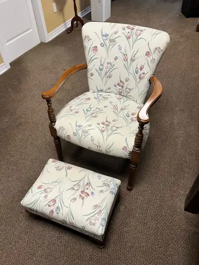 Beautiful, reapolstered chair and footstool with history. Very comfortable without the bulk. Perfect...