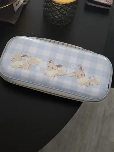 POKEMON EEVEE NINTENDO SWITCH 2 CASE IN GREAT CONDITION, View more