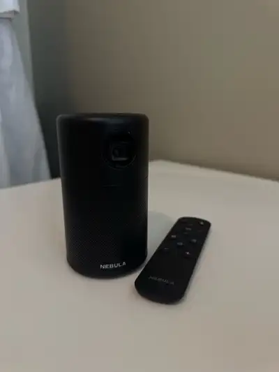 Nebula Capsule Projector- works really well No longer have the box, sorry Selling because I don’t us...
