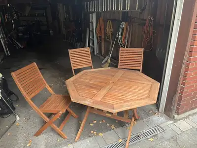Solid teak dining table plus three chairs, View more