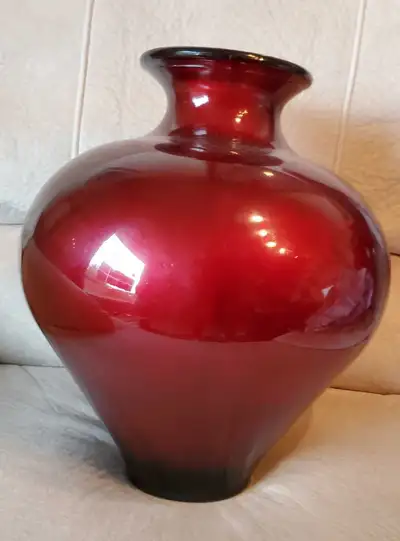 Vintage Red Heavy Vase made in Spain. Some scratches. 31.5 inches in round centre, 13 .5 inches tall...