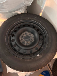 4 Winter Tires Michelin 215/60/16 with Steel Rims.