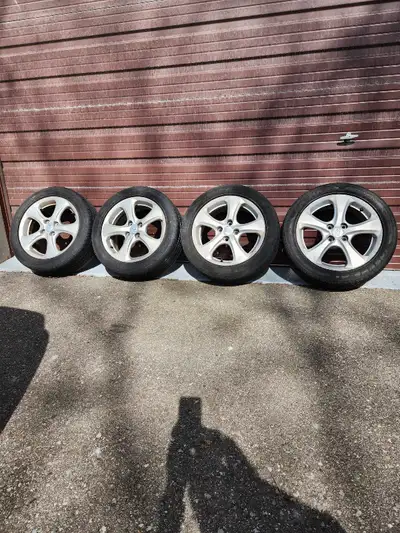 Hyundai Elantra rims and tires for 4X100, 205/50/16, 70% as is, need one tire. No low ballers please...