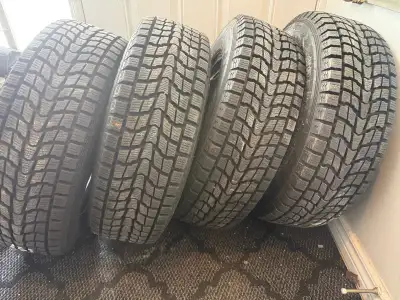 I am selling a set of four Dunlop Grandtrek 205/70R16 97Q M+S snow tires, perfect for winter driving...