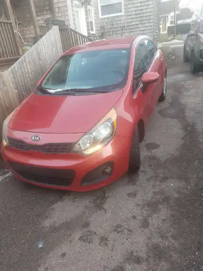 2013 Kia Rio Hatchback Comes with 2 sets of tires on rims, summer and winter. Replaced 2 winter tire...