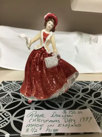 Various Royal Doulton and Coalport figurines. Royal Doulton Belle of the Ball. $275. Royal Doulton W...
