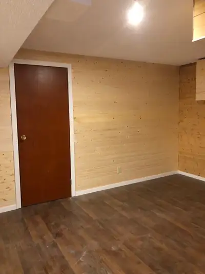 Basement suite 2 bedroom + den 5 minutes walking to CTrain