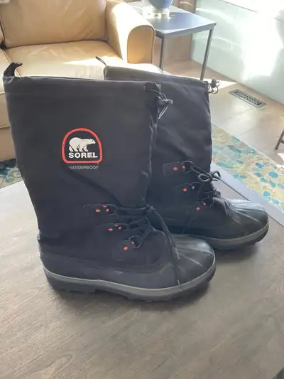 Men's size 14 Sorel's winter boots with felt liners. a little wear on the very back heel portion of...