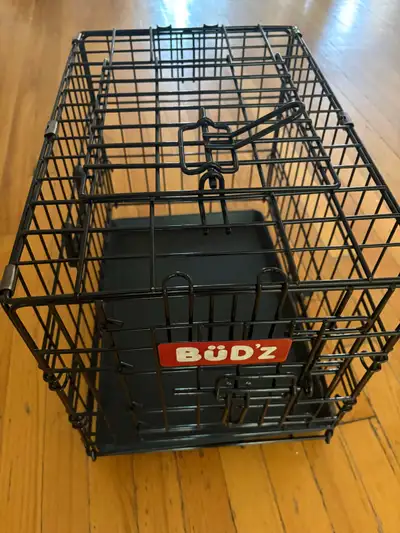Je vends une cage Bud'z en métal noir, idéale pour les petits animaux. Cette cage a été utilisée, ma...