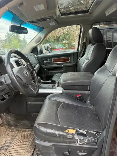 Laramie Sunroof Leather interior New battery, extra set of tires. Check engine light on. Runs good....