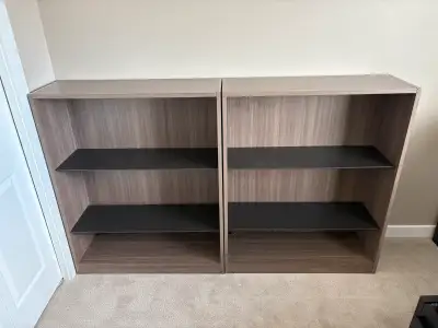 Near perfect condition. These 2 bookcases feature adjustable shelves for versatile storage and displ...