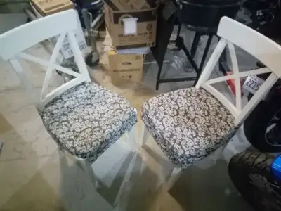 2 Ikea "Ingolf" chairs, solid wood, like new. Includes cushions., View more