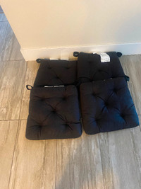 4 black IKEA chair cushions