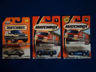This lot includes a silver (#19) and blue (#5) Dodge Viper GTS, as well as a blue (#10) Dodge Viper...
