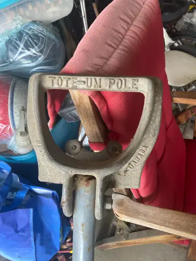 I'm offering a vintage Tote-Um Pole boat holder designed to attach to a vehicle hitch, providing a s...
