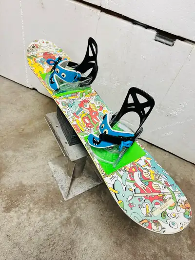Like new Burton kids snowboard 100cm with Burton Grom bindings, View more