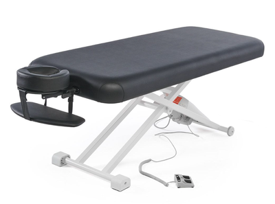 The Sukha Flat Top Electric Massage Table from Ortho Canada. Height range of 17” to 38.5” smoothly a...