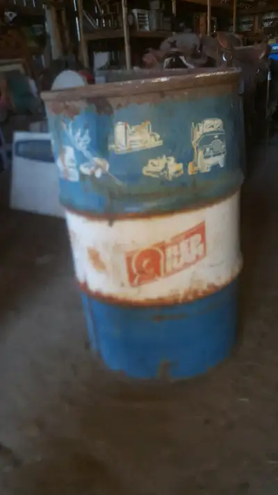 Really cool Red Ram motor oil drum. Awesome patina, with great graphics. Images of tractors, vehicle...
