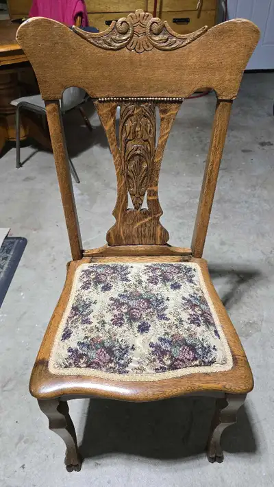 Nice old sturdy chair for sale. $10. Located between Tillsonburg and Aylmer.