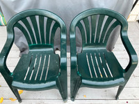 two green Patio Chairs