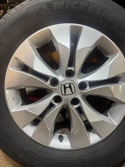 Four Rims and Tires for a Honda CRV 2014.