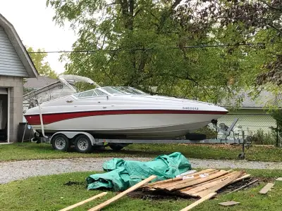 22.5 ft boat and trailer 5 litre merc. Boat is real nice shape with new sunbrella and camper enclosu...