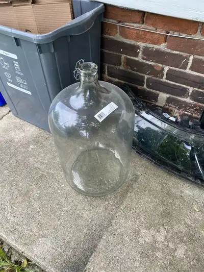 Glass. by the side of the house for pick up