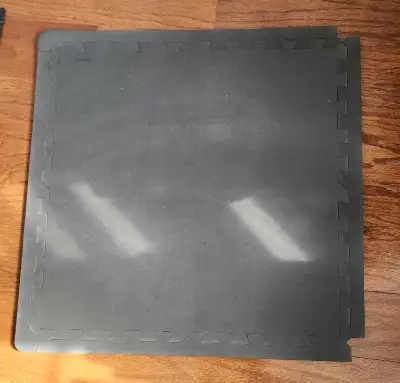 24x24" black foam tiles.