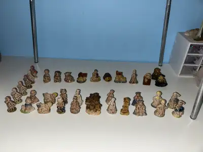 Red Rose Tea Figurines, View more
