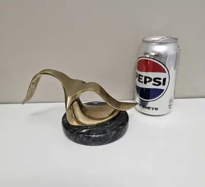 Vintage Brass bird on marble statue In great condition, but the bird shifts back and forth a little...