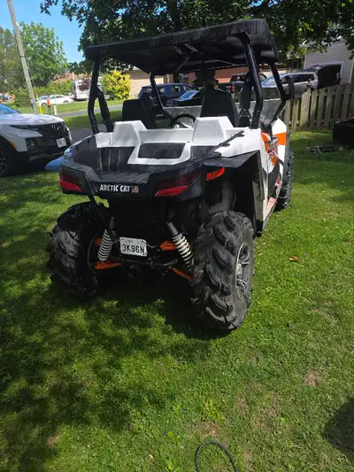 Side by side, two seater. New breaks, brand new tires. New wench and we are giving a plow head . Lot...
