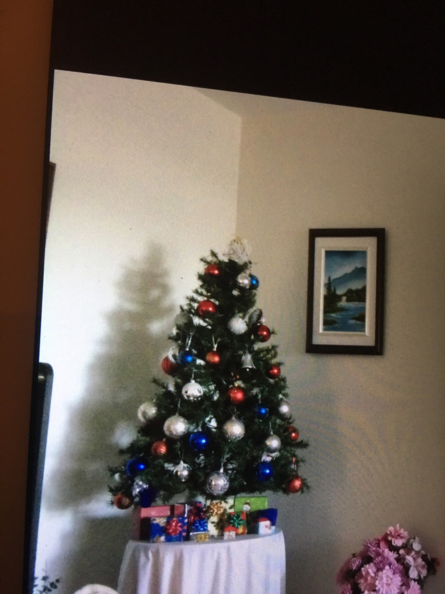 4 ft. Christmas tree for sale.   Complete with lights, stand som in Other in City of Toronto - Image 2
