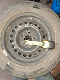 185/65/R14 tires on steel rims--balanced-all season--good tread