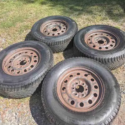 4 Nokian snow tires with rims, 265/70R17 115T. The tires are studable and have good tread. $600 or b...